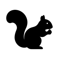 Silhouette of a Squirrel with Large Bushy Tail Eating Something Delicate