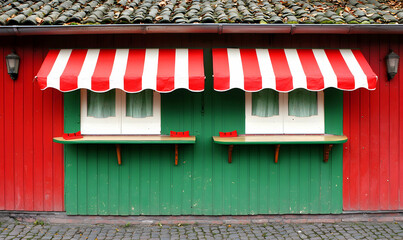 Colorful building facade featuring red/green paint, awning, and serving windows