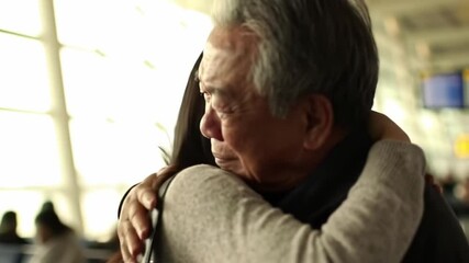 Emotional reunion between daughter and father at airport during farewell