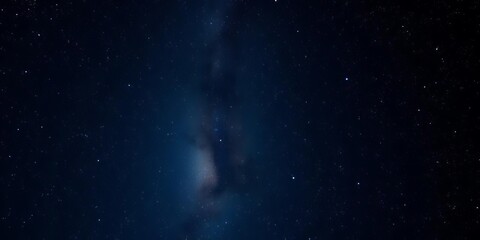 Fototapeta premium Deep indigo night sky, countless twinkling stars, cosmic dust trails, cosmic dust, ethereal