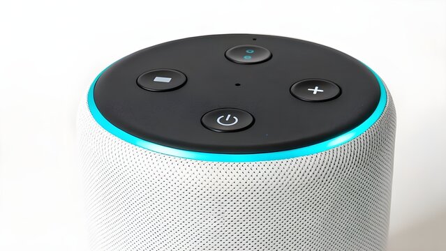An Amazon Echo Dot sits on a white surface, showcasing its sleek design and compact size