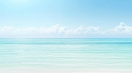Fototapeta premium Vast expanse of tranquil turquoise ocean and bright sky.