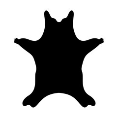 Black silhouette of a bear vector skin rug on a white background
