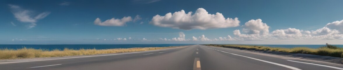 Fototapeta premium Asphalt road meets ocean, blue sky with clouds , cloudscape, ocean, highway