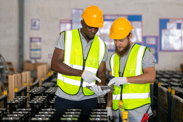 Person professional worker wearing safety uniform using tablet inspect goods on shelves in...