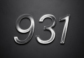 Chrome metal 3D number design of 931 on grey background.