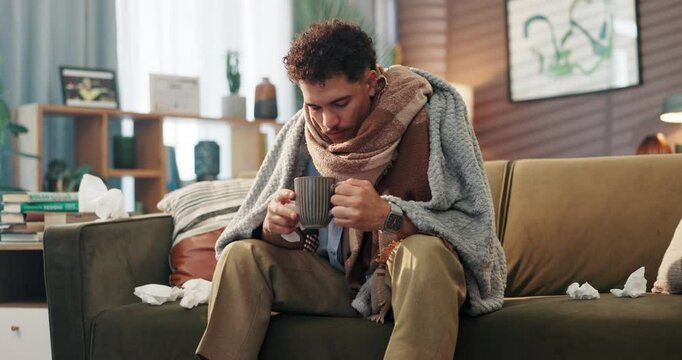 Sick, man and sneeze with tea on sofa for illness recovery, lemon treatment and healing. Cold, person or blanket with honey drink for influenza virus, health benefits and remedy for infection in home