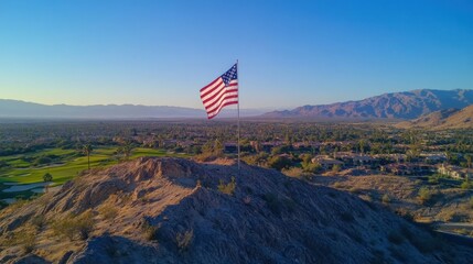 Majestic American Flag Overlooking a Breathtaking Desert Landscape
