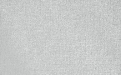 High resolution texture background. White primed canvas ready for painting, showcasing rough surface.
