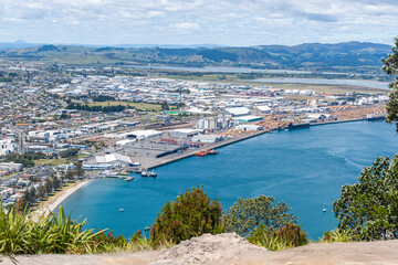 Fototapeta premium Wide view from top of Mount over Tauranga harbour and port