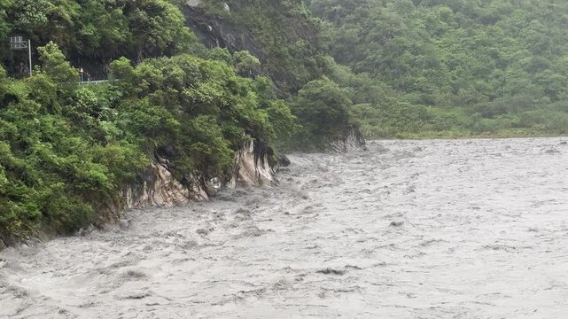 Churning Muddy Flood Waters After Tropical Storm Dumps Heavy Rain - Haikui