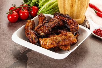 Grilled pork ribs in barbecue sauce