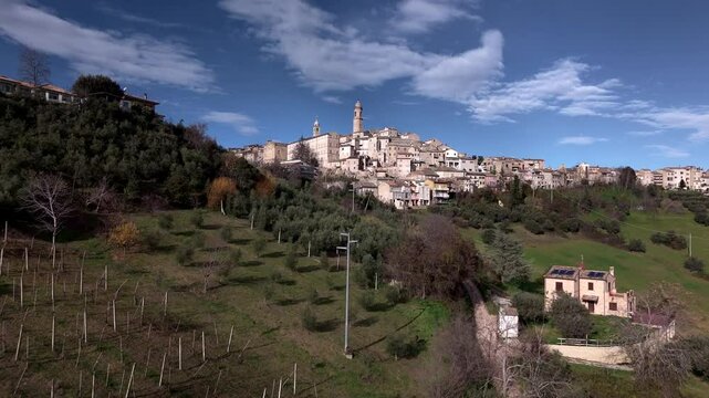 Stunning aerial footage of Petritoli, Le Marche, Italy. Captured on a sunny afternoon, featuring the medieval skyline and surrounding countryside from above.