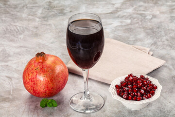 Sweet fresh pomegranate juice with fruit