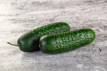 Ripe green raw two cucumbers