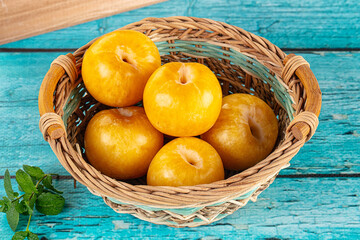 Raw ripe sweet yellow plums