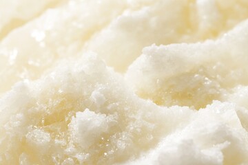 Close-up view of a textured, creamy substance.