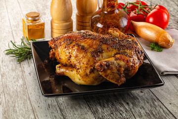 Baked in oven whole chicken with spices