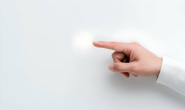 Gesture of a Human Hand Pointing at a Blank Surface or Screen