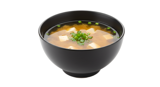 Bowl of miso soup with tofu and green onions.  A savory broth, comforting and healthy