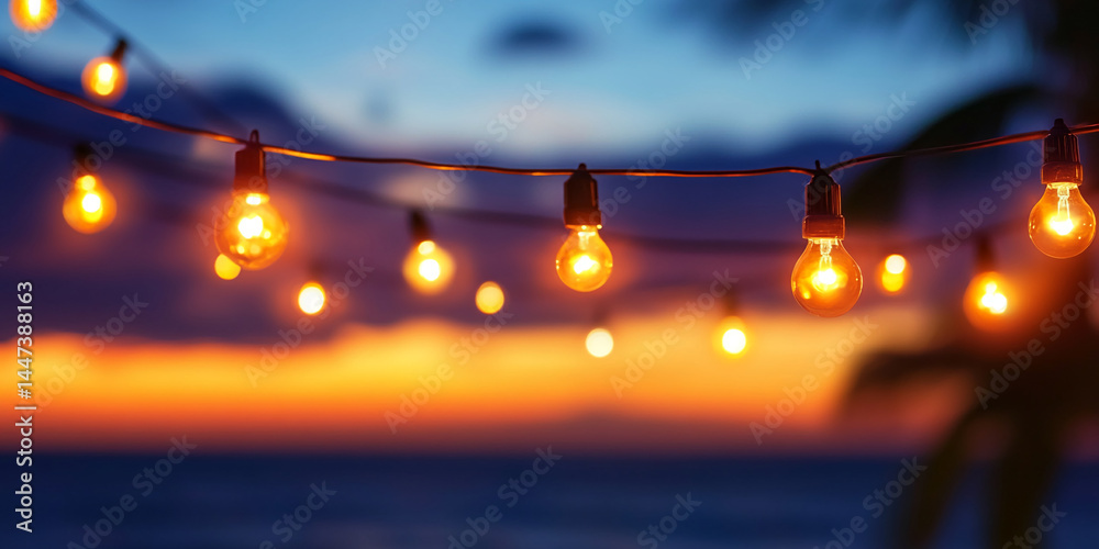Poster string of warm-toned lightbulbs glowing against a blurred sunset backdrop, creating a romantic and i