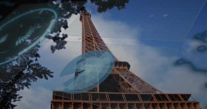 Eiffel Tower rising into blue sky, displaying floating circular HUDs and grid overlays