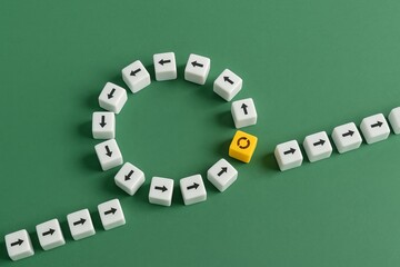 Alternative Choices Decision Making Process Conceptual Image Arrows Cycle Options Business Strategy Planning Path Direction Future Success Development Progress White Cubes Green Background idea growth