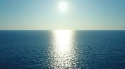 Fototapeta premium Radiant sun reflecting on a vast ocean expanse.