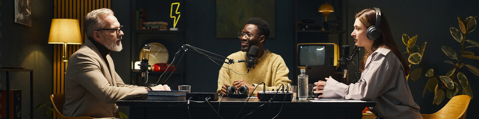 Header with people talking to influencer during podcast
