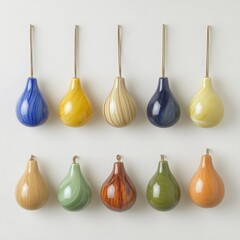 Colorful decorative teardrop ornaments hanging on wall display