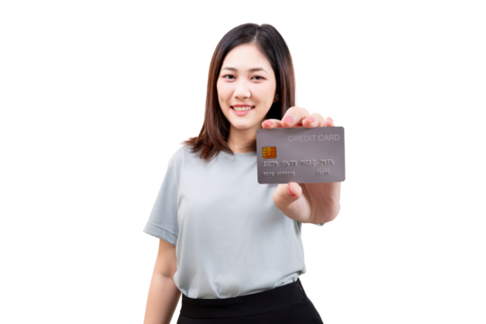 Asian woman smiling and holding a credit card forward.