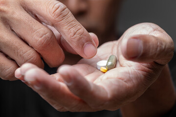 Taking Daily Medications from Hand