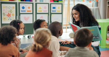Reading, students and teacher with children in classroom for education, books and creative. Growth, kindergarten and academy with woman and kids at school for youth, knowledge and child development