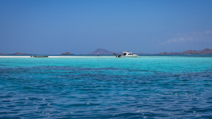 Immerse yourself in the peacefulness of the stunning turquoise waters, where islands are scattered...