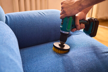 Effective Upholstery Cleaning Using a Power Tool on a Beautiful Sofa for the Best Results