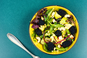 Plate of colorful fresh salad.