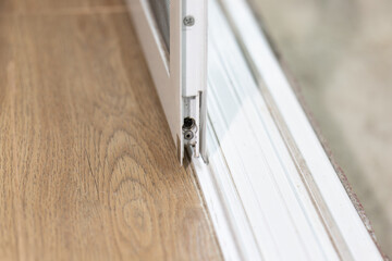 Aluminium sliding  door that comes off bottom track.