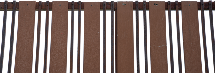 Closeup of a wooden fence with vertical slats transparent