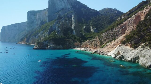 Beautiful coastline in italian island. Cala Goloritze, Sardinia. Aerial dolly out footage.