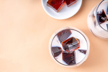 Homemade milky tea jelly, cold summer drink with black tea jelly and tea milk. Thai style iced cocktail, copy space