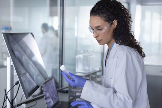 Woman scientist Concentrating on  Results and Analysis