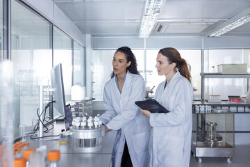 Female scientists Colorate in a Modern oratory Setting