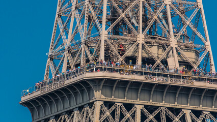 Close up view of middle section of the Eiffel Tower timelapse in Paris, France.