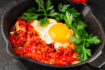 Fried egg tomatoes shakshuka vegetable dish appetizer fresh delicious gourmet food background on the table rustic food top view copy space vegetarian  food