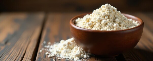 Rustic ceramic bowl filled with unbleached bran flour , still life, ingredient, texture