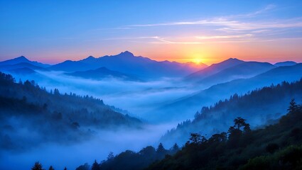 Fototapeta premium Serene sunset over blue mountains and misty peaks