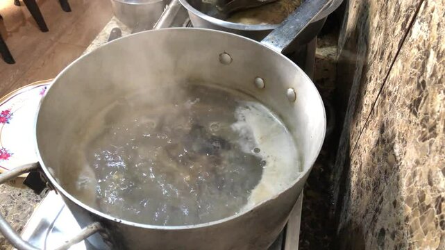 Placuna saddle oysters, also known as windowpane or capiz oysters, are soaked in hot boiling water so that the meat falls out on its own