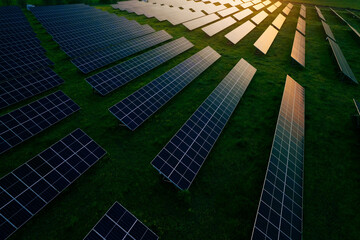 Solar panels park generating green energy electric at sunset.Green energy reduce carbon emissions...