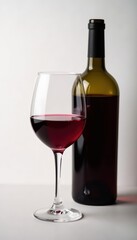 Fototapeta premium Elegant red wine in a crystal glass, bottle nearby, bar, rich
