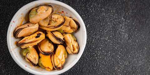 Mussels canned seafood appetizer dish organic product fresh tasty gourmet food background on the table rustic food top view copy space keto paleo pescetarian diet vegetarian food